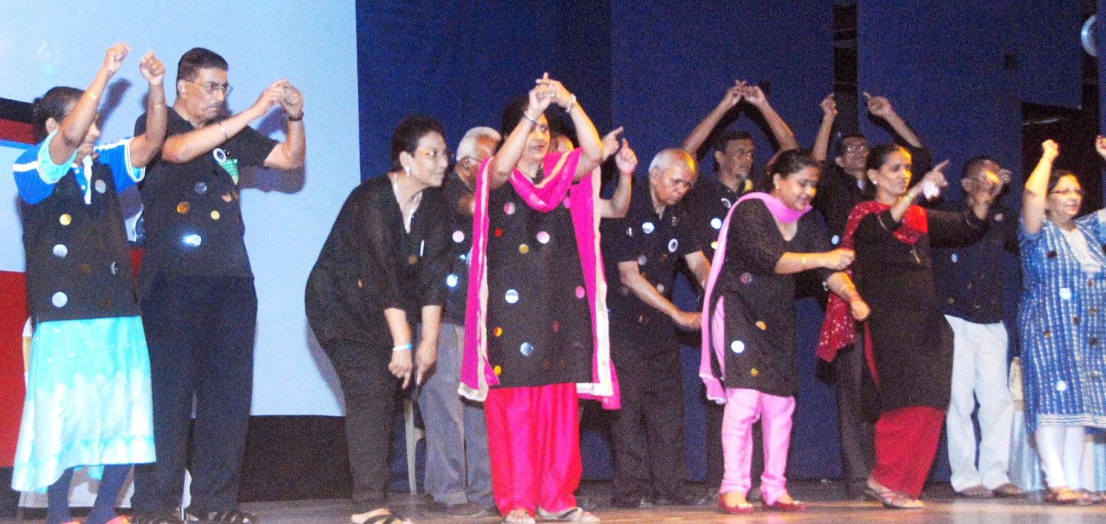 People living with Parkinsons disease dancing at a World Parkinsons Day event