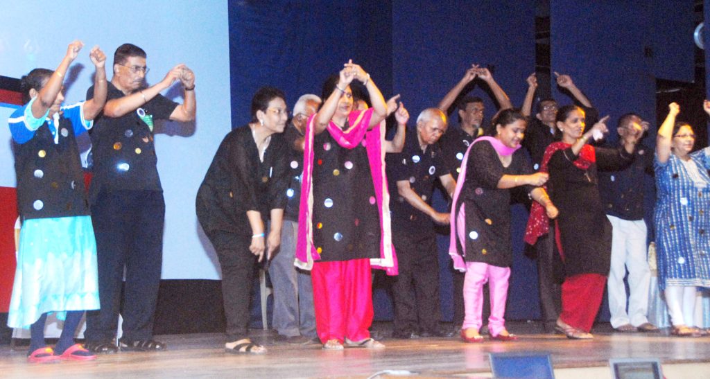 People with Parkinson's disease dancing at a World Parkinson's Day event, an example of rhythm based movement