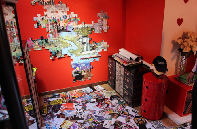 Marco Brusadelli in the room that houses his rave flyer collection