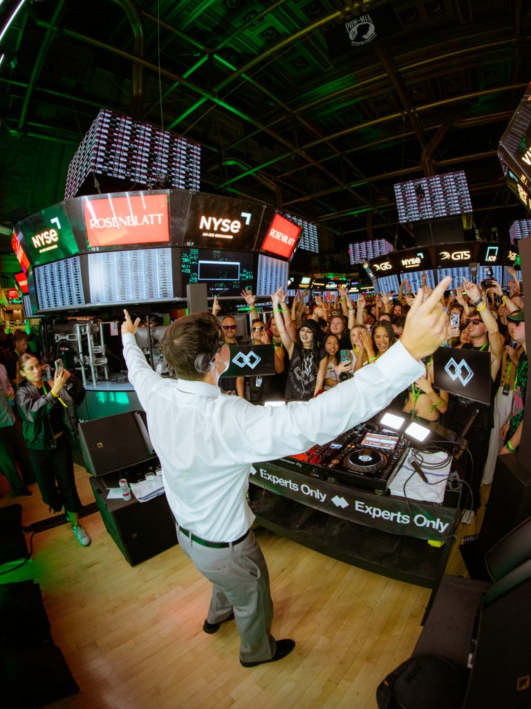 John Summit playing to the crowd on the New York Stock Exchange trading floor