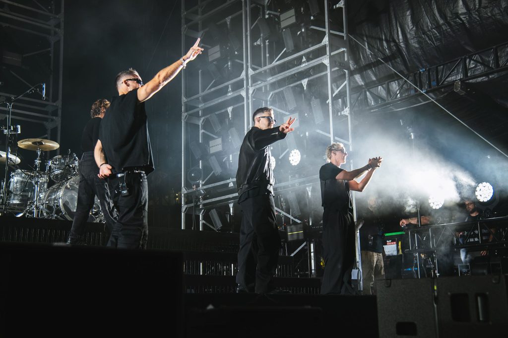 RÜFÜS DU SOL waving to the crowd at Petco Park in San Diego during the biggest electronic tour ever