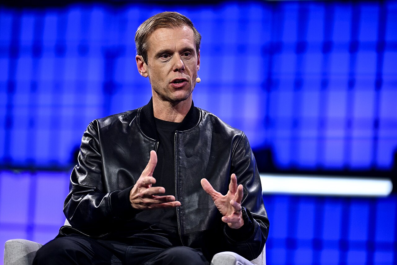 Armin van Buuren speaking on stage in November 2025