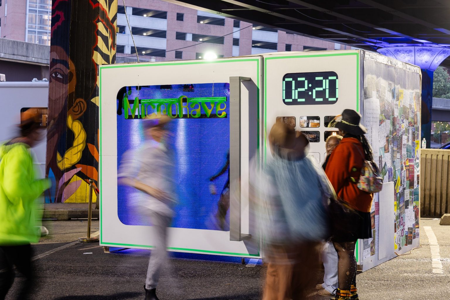 The poster covered side of the MicroRave installation by Formstone Castle