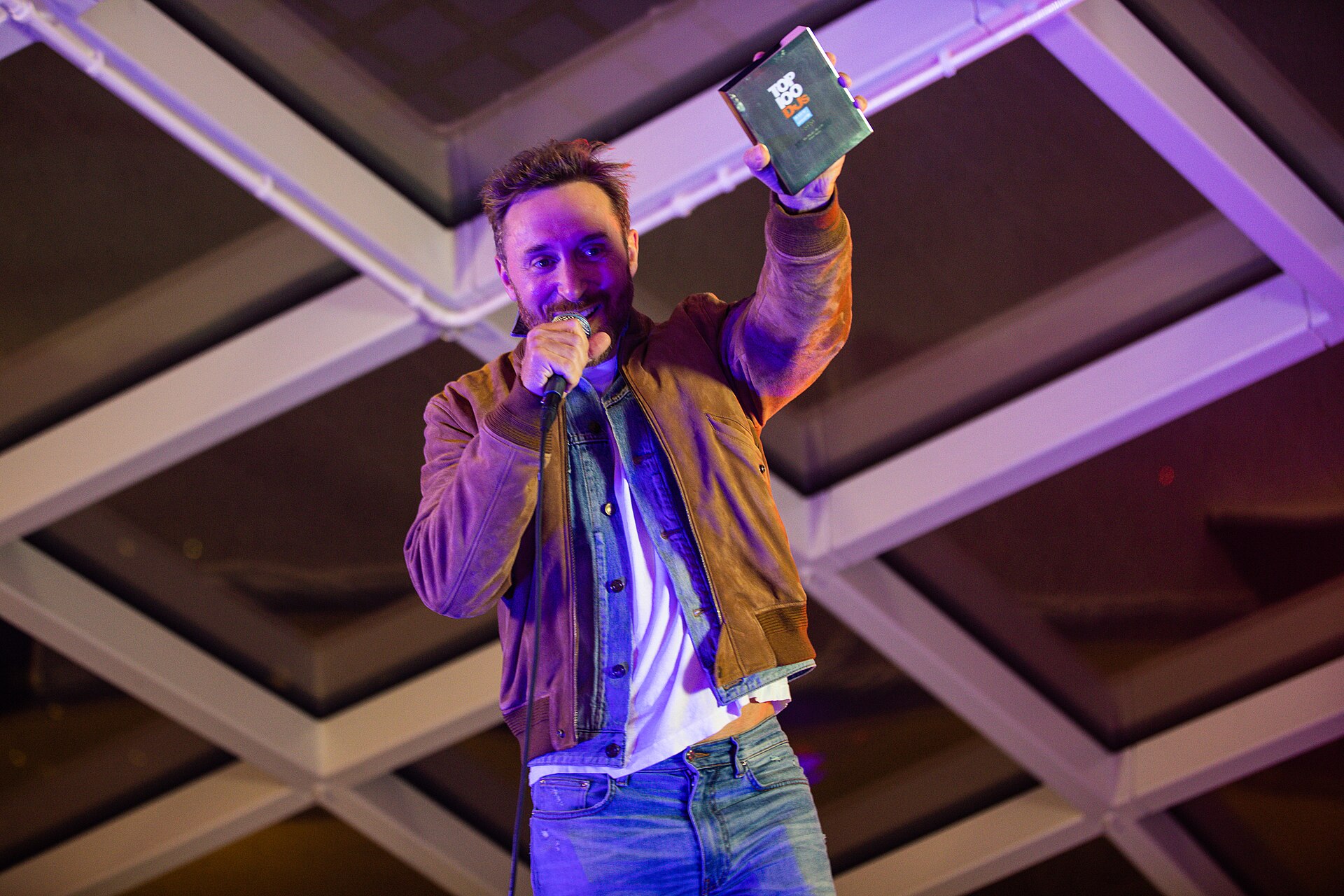 David Guetta celebrating a DJ Mag Top 100 number one win