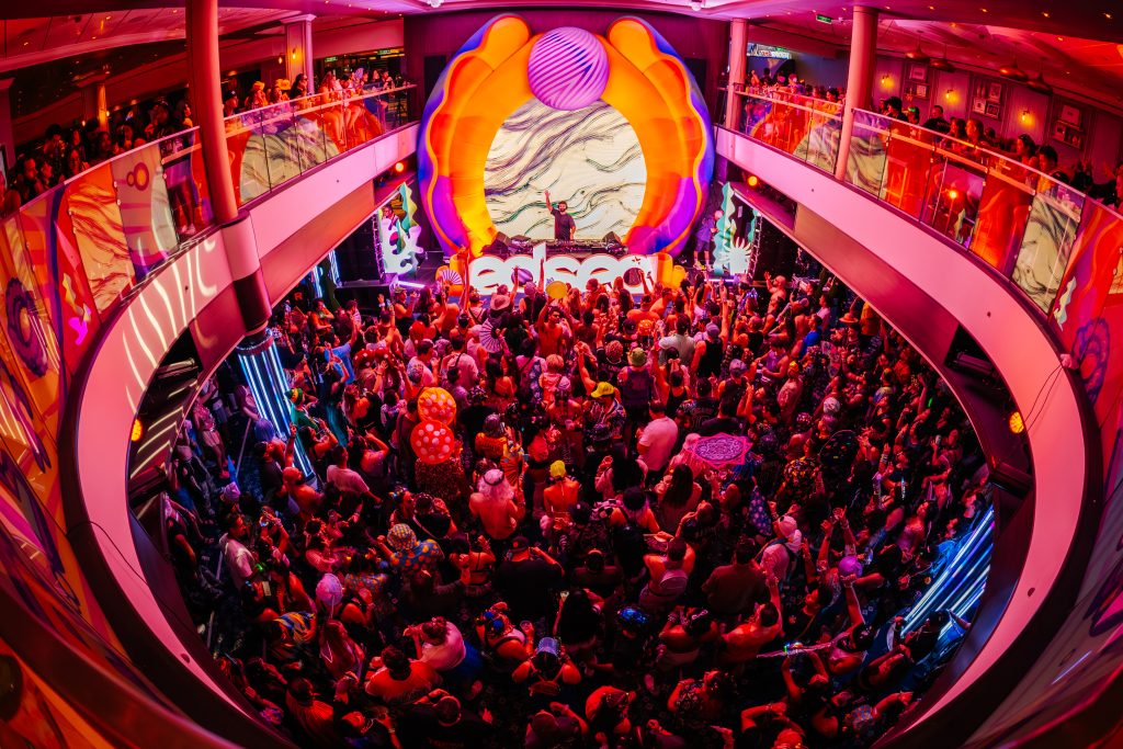 Crowd in the Norwegian Joy atrium during a previous EDSea sailing