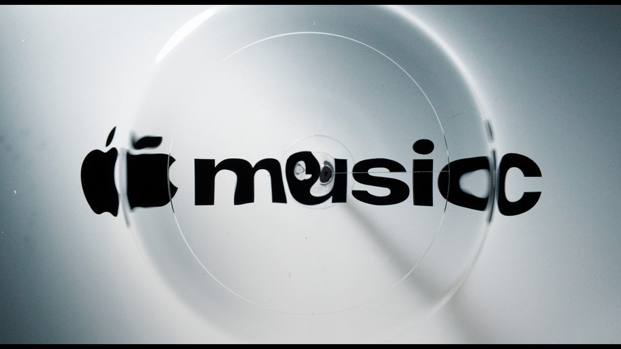 Apple Music rebrand: the new logo distorted by ripples in mineral oil