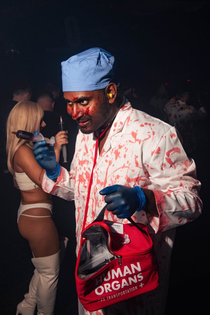 A clubber in zombie surgeon costume at Ministry of Sound Halloween in London