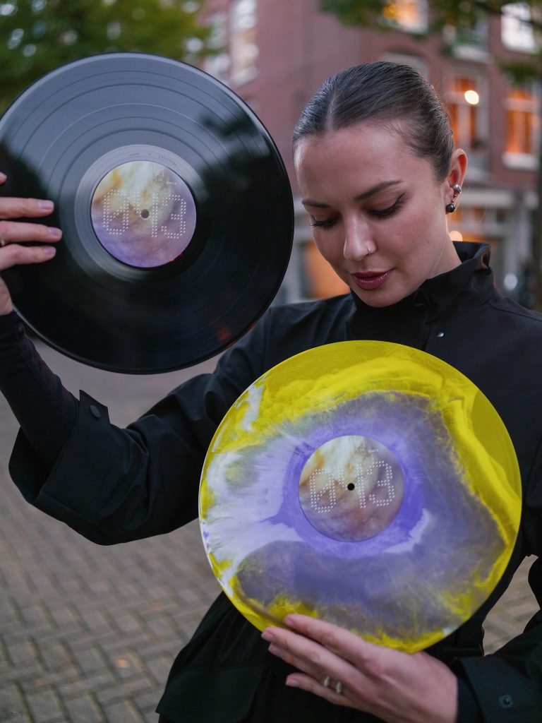 Nastia holding vinyl of the first TECHNO Records split EP, 2026