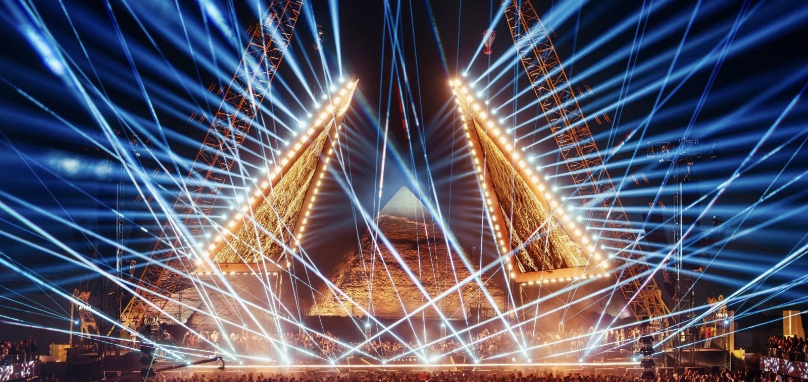 Starlight Festival Giza main stage lasers in front of the Great Pyramids